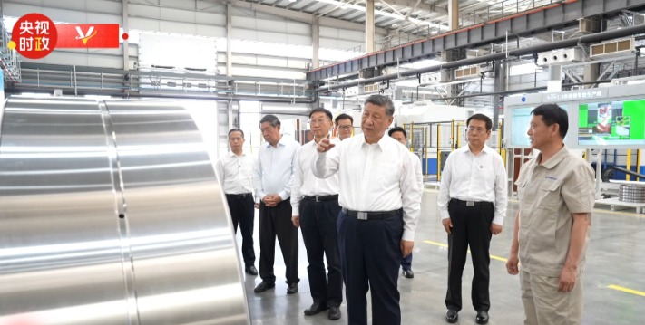Xi Jinping, center, visits Luoyang. Photo from state-owned CCTV news.