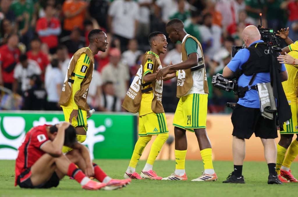 South Africa players celebrate after the 1-0 victory in the 2026 World Cup Group A football match between South Africa and South Korea at the Monterrey Stadium in Guadalupe, Mexico, on June 24 (AFP)