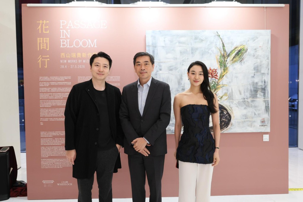 Ricky Wong, center. Wheelock Properties