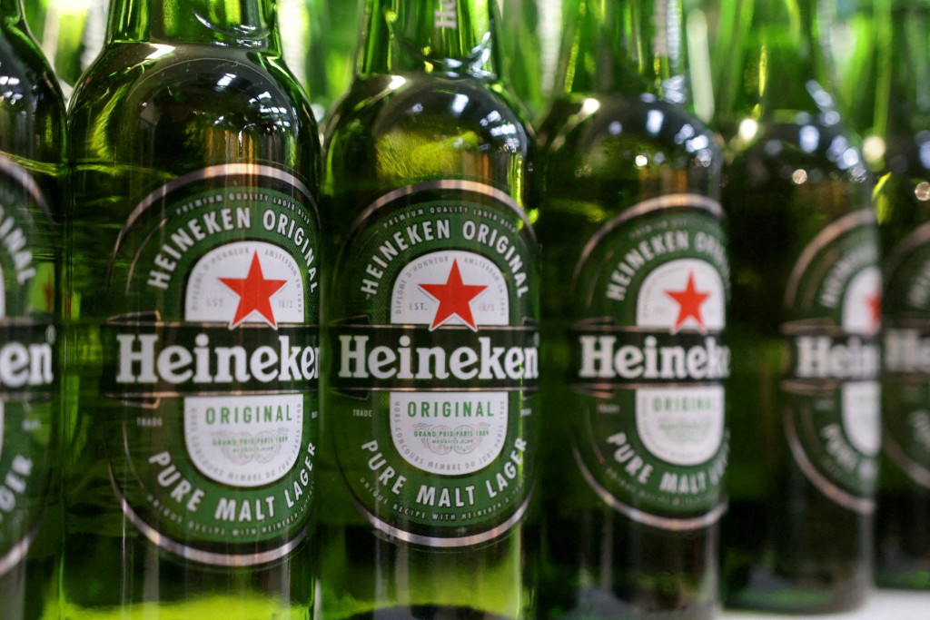 Bottles of Heineken beer are displayed in a supermarket. REUTERS/Dado Ruvic.
