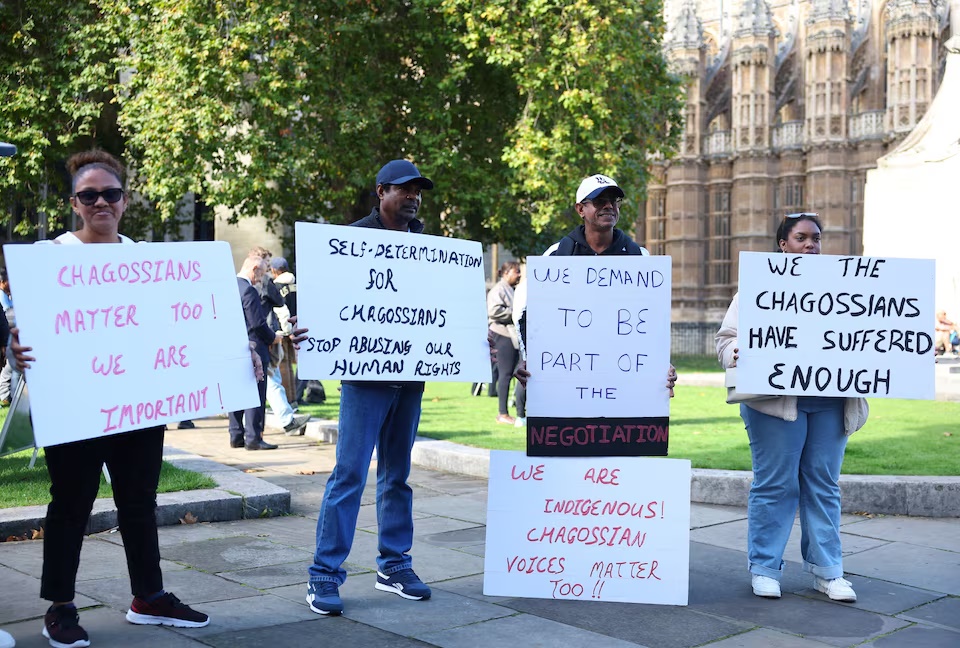 UK-based Chagos Islanders protest over the planned ceding of sovereignty of the islands by Britain to Mauritius, outside of the Houses of Parliament, in London, Britain, October 7, 2024. REUTERS/Toby Melville/File Photo