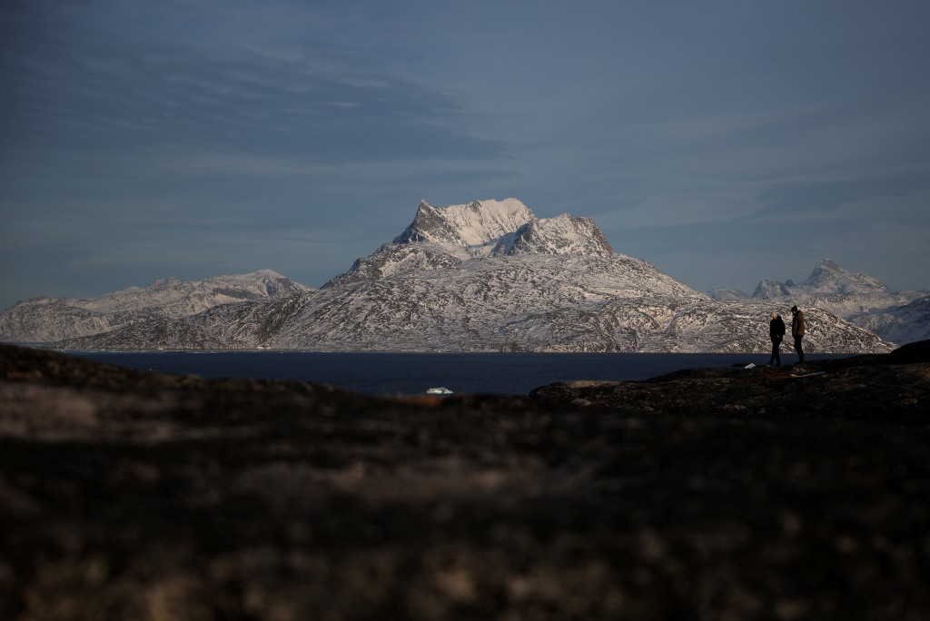 A couple walks at the old harbour of Nuuk, Greenland. (Reuters)