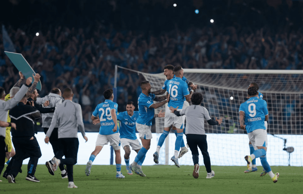 Napoli's Giovanni Di Lorenzo, Rafa Marin and teammates celebrate after winning Serie A. (REUTERS/Remo Casilli)