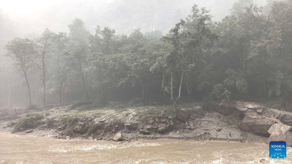 This photo taken on Aug. 26, 2026 shows an area near Gyirong Port in southwest China's Xizang Autonomous Region. A mudslide struck near Gyirong Port in southwest China's Xizang Autonomous Region on Wednesday, with people feared missing, local authorities said. The disaster has cut off roads leading to the port on the Chinese side, as well as communications and power supplies, according to the emergency management bureau of Gyirong County in Xigaze City. Xinhua