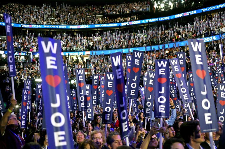 The Democratic national convention gives Joe Biden a fitting send-off for his service to party and country, putting, right, pro-Palestinian protesters in the shade. AFP