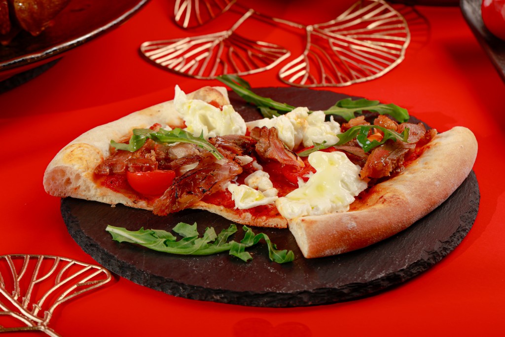 Buffalo Mozzarella Pizza with Hang Heung Preserved Duck Leg Arugula and Tomato Sauce.
