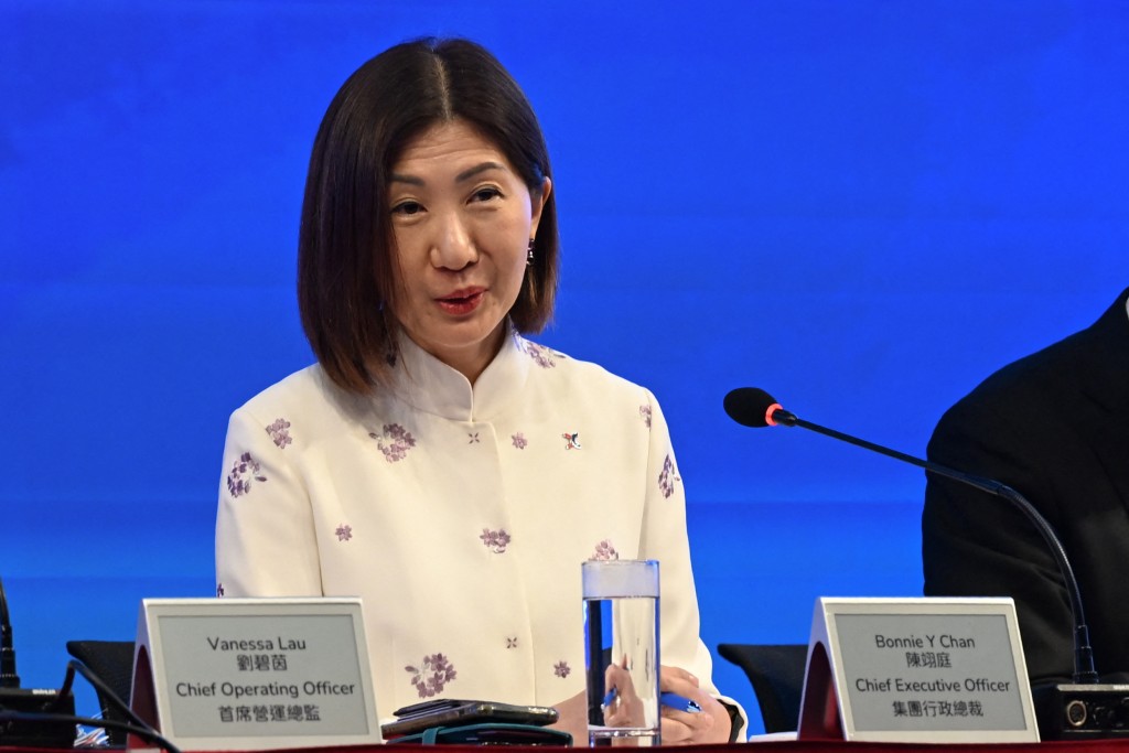 Bonnie Chan speaks during the 2025 Full Year Results Presentation in Hong Kong on February 26, 2026. AFP