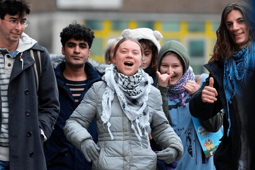 Environmental activist Greta Thunberg, centre, arrives with other protesters at Westminster Magistrates Court in London, Friday, Feb. 2, 2024. A judge has acquitted climate activist Greta Thunberg of a charge that she had refused to leave a protest that blocked the entrance to a major oil and gas industry conference in London last year. Thunberg was acquitted along with four other defendants. (AP Photo/Kirsty Wigglesworth) Environmental activist Greta Thunberg, centre, arrives with other protesters at Westminster Magistrates Court in London, Friday, Feb. 2, 2024. A judge has acquitted climate activist Greta Thunberg of a charge that she had refused to leave a protest that blocked the entrance to a major oil and gas industry conference in London last year. Thunberg was acquitted along with four other defendants. (AP Photo/Kirsty Wigglesworth)