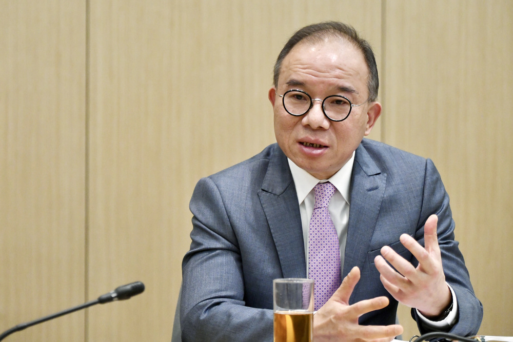Erick Tsang, top, says there are concerns a long weekend for students will affect the district council elections on December 10. SING TAO Erick Tsang, top, says there are concerns a long weekend for students will affect the district council elections on December 10. SING TAO