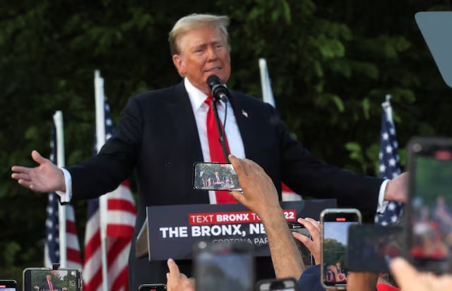 Attendees record former U.S. President and Republican presidential candidate Donald Trump on their phones as he holds a campaign rally at Crotona Park in the Bronx borough of New York City, U.S., May 23, 2024. REUTERS/Brendan McDermid/File Photo Attendees record former U.S. President and Republican presidential candidate Donald Trump on their phones as he holds a campaign rally at Crotona Park in the Bronx borough of New York City, U.S., May 23, 2024. REUTERS/Brendan McDermid/File Photo