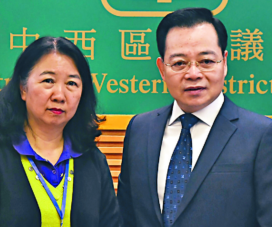 It's all smiles for Jeremy Young and Ted Hui at the start of the Central and Western district council term. Above: Cheng Lai-king and Victor Yeung. It's all smiles for Jeremy Young and Ted Hui at the start of the Central and Western district council term. Above: Cheng Lai-king and Victor Yeung.