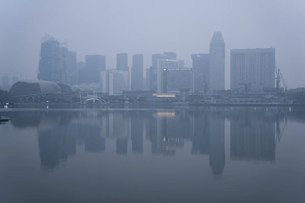 Buildings shrouded in haze from forest fires in neighbouring Indonesia, in Singapore, October 13, 2026. REUTERS/Kokkai Ng