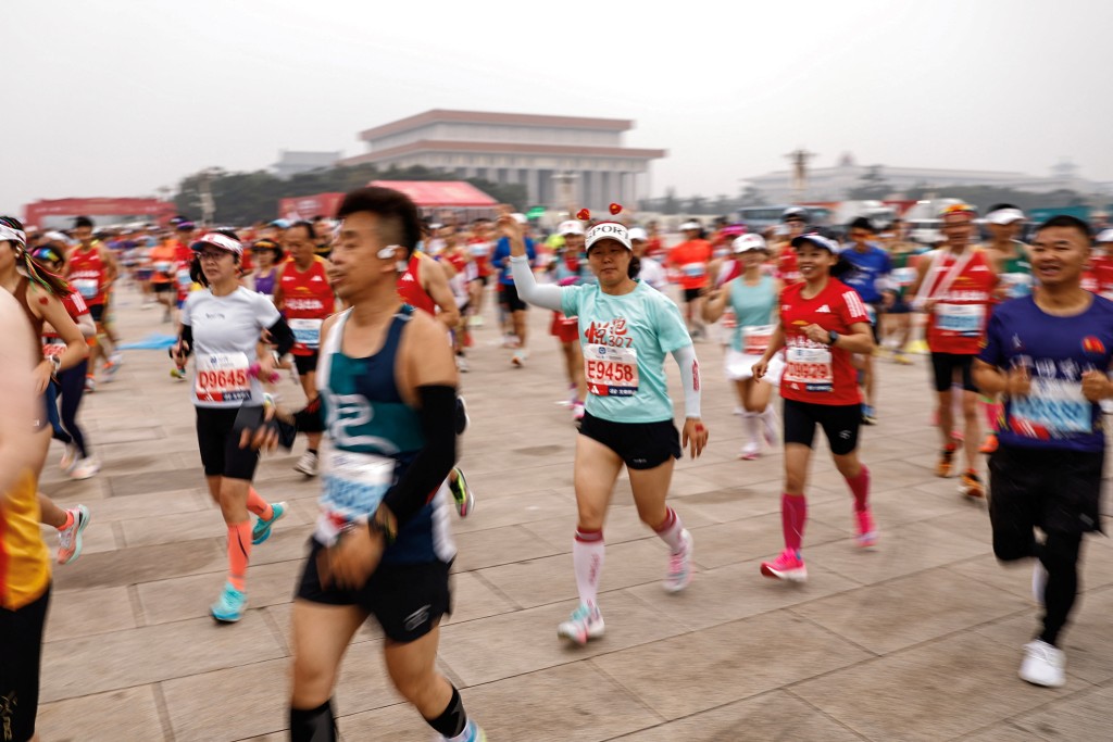 Participants take part in the Beijing Marathon, at Tiananmen Square in Beijing, China October 29, 2023. REUTERS