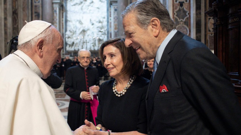 FILE PHOTO: Pope Francis greets U.S. Speaker of the House Nancy Pelosi during the Mass of Saint Peter and Paul, in St Peter's Basilica, at the Vatican, June 29, 2022. REUTERS