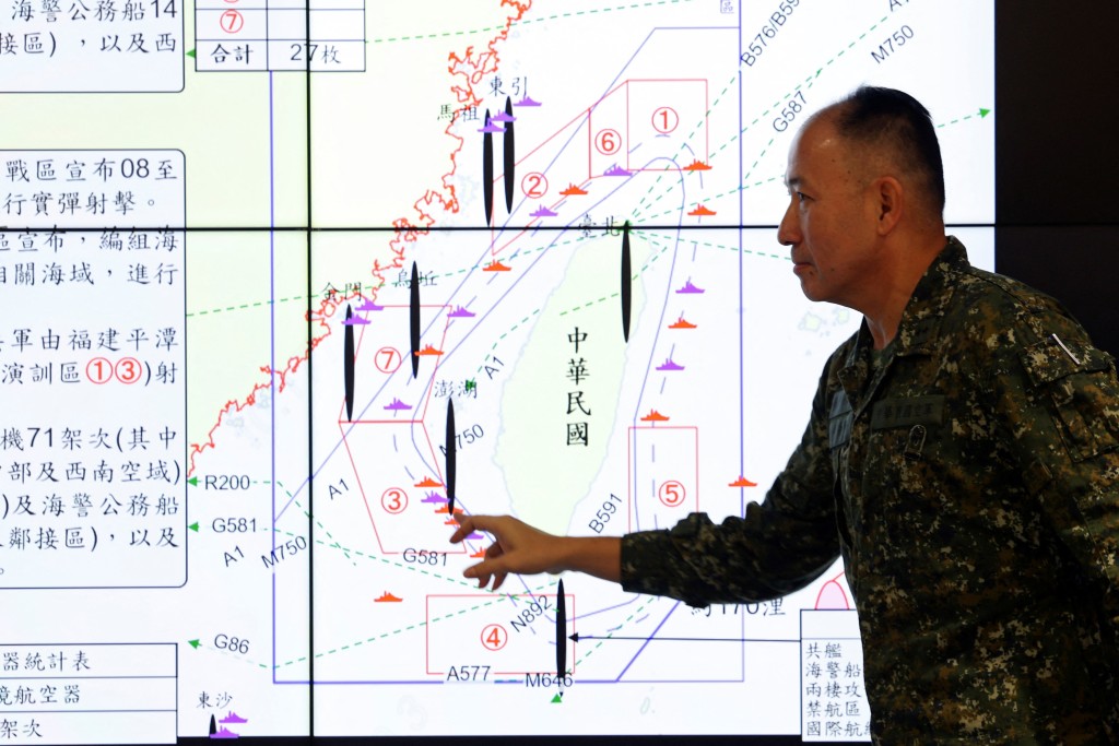 Hsieh Jih-sheng, deputy chief of the general staff for intelligence at Taiwan's defence ministry, points at a map during a press conference about China’s military drills around Taiwan, in Taipei, Taiwan December 30, 2025. (Reuters)