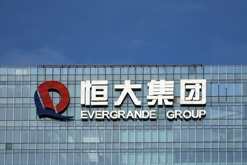 The company logo is seen on the headquarters of China Evergrande Group in Shenzhen, Guangdong province, China September 26, 2021. REUTERS