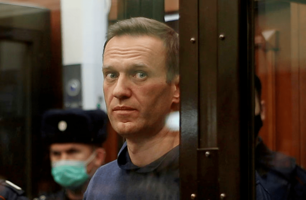 Alexei Navalny inside a defendant dock during the announcement of a court verdict in Moscow, February 2, 2021. via Press service of Simonovsky District Court Alexei Navalny inside a defendant dock during the announcement of a court verdict in Moscow, February 2, 2021. via Press service of Simonovsky District Court