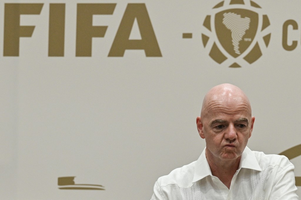 Photo by DAVID SALAZAR / AFP  FIFA President Gianni Infantino gestures during his visit to the new Concentration Hotel of the Colombian Football Federation in Barranquilla, Colombia, on February 24, 2026.