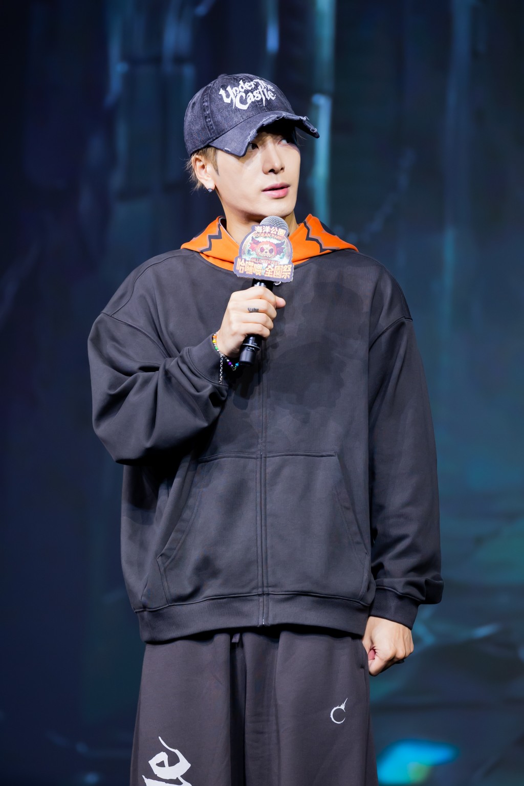 Jackson Wang appears slightly tired during his Ocean Park appearance.