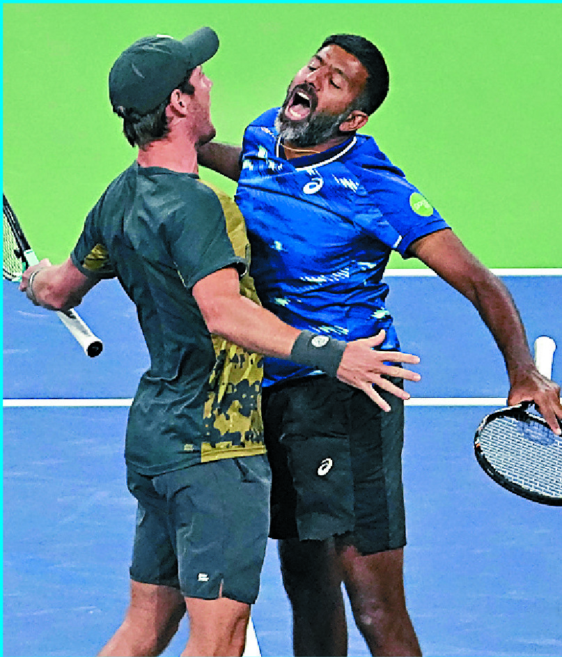 Rohan Bopanna celebrates with Matthew Ebden, left, on matchpoint. AP Rohan Bopanna celebrates with Matthew Ebden, left, on matchpoint. AP