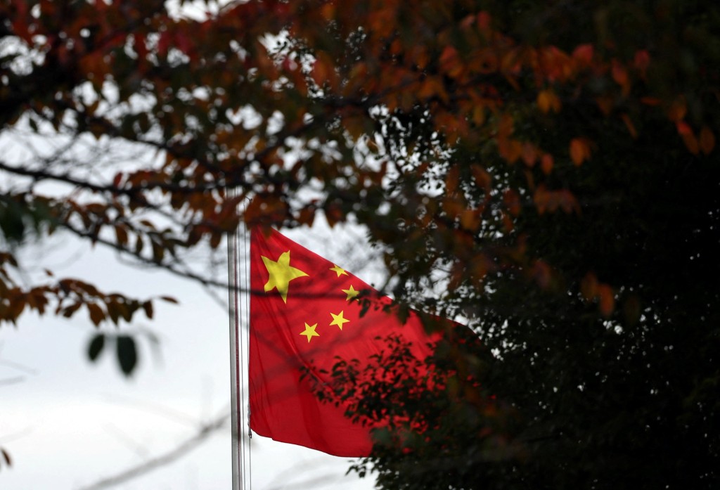 A Chinese national flag is hoisted at the Chinese embassy in Tokyo, Japan November 18, 2025. REUTERS/Issei Kato