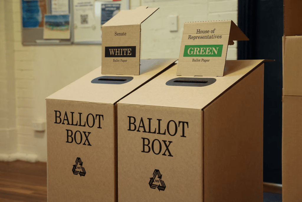 Ballot boxes are seen at a polling station on the day of the Australian federal election, in Sydney, Australia, May 3, 2025. REUTERS/Hollie Adams 