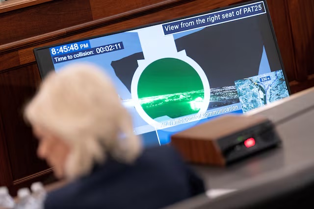 A cockpit recording plays as National Transportation Safety Board (NTSB) Chair Jennifer Homendy testifies during a Senate Commerce, Science, and Transportation Committee hearing on the January 29, 2025, midair collision between American Airlines Flight 5342 and a U.S. Army Black Hawk helicopter, on Capitol Hill in Washington, D.C., U.S., February 12, 2026. REUTERS/Nathan Howard/File Photo