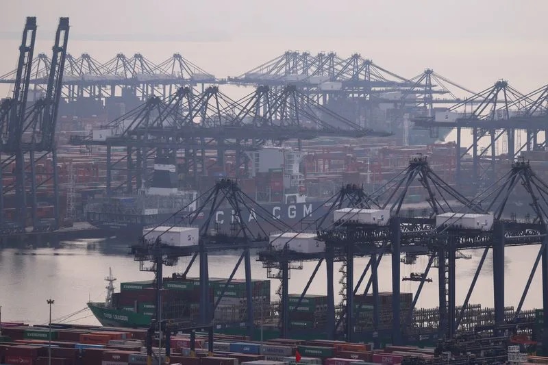 Cranes and cargo ships at a terminal of the Yantian port in Shenzhen, Guangdong province, China October 30, 2025. REUTERS/Tingshu Wang · Reuters