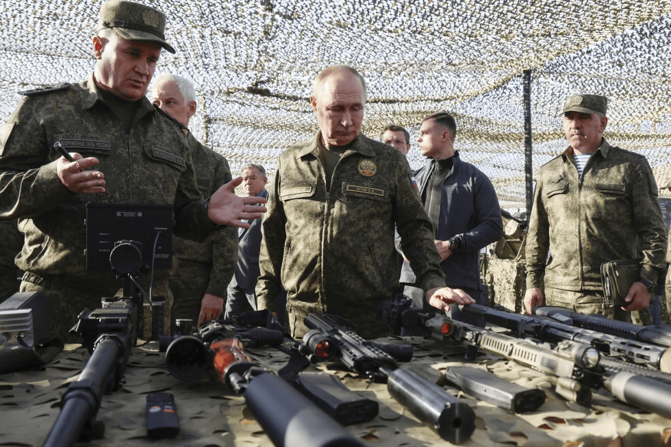 Russian President Vladimir Putin, centre, accompanied by Commander-in-Chief of the Russian Ground Forces Andrey Mordvichev, left, inspects Russian weapons and equipment during his visit to the Russian-Belarusian joint military drills “Zapad 2025" (West 2025) at the Mulino training ground in Nizhny Novgorod region, Russia, Tuesday, Sept. 16, 2025. (Mikhail Metzel/Sputnik, Kremlin Pool Photo via AP)