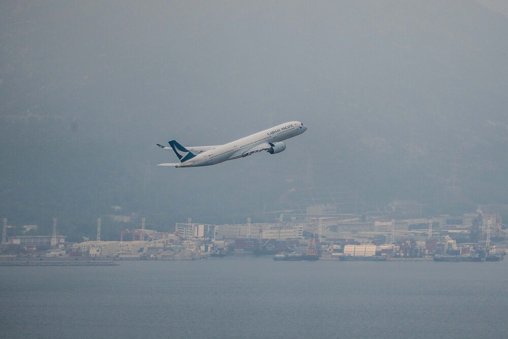 A passenger aircraft operated by Cathay Pacific Airways Ltd. takes off from the Hong Kong International Airport in Hong Kong. (File) A passenger aircraft operated by Cathay Pacific Airways Ltd. takes off from the Hong Kong International Airport in Hong Kong. (File)