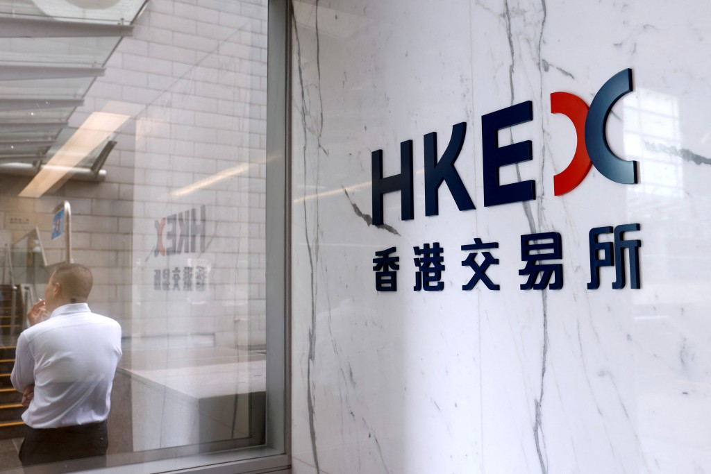 The logo of Hong Kong Exchanges & Clearing Ltd. (HKEX) is seen at the financial Central district in Hong Kong, China September 14, 2020. REUTERS/Tyrone Siu/File Photo