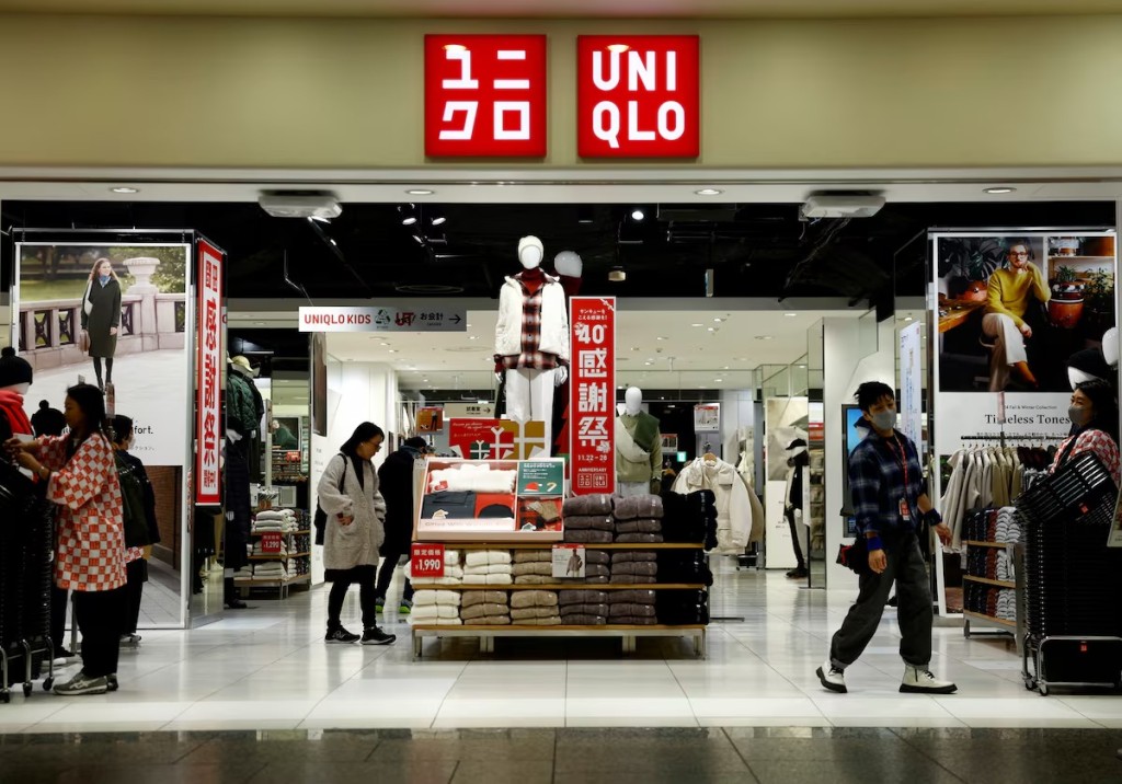 Shoppers look around for clothes at a Fast Retailing's Uniqlo store in Tokyo, Japan. REUTERS