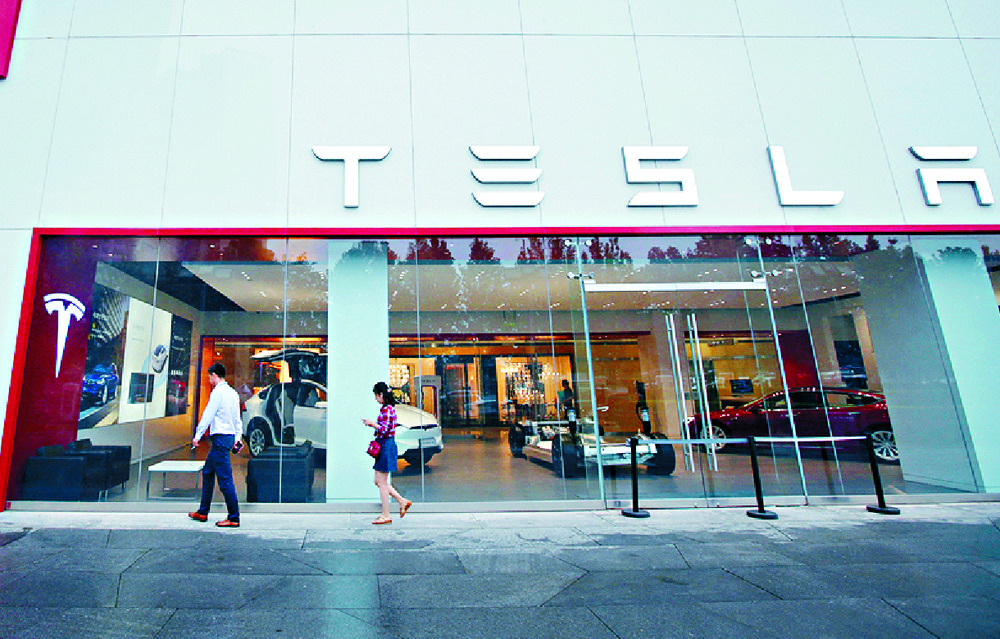 A Tesla showroom in Beijing. REUTERS A Tesla showroom in Beijing. REUTERS