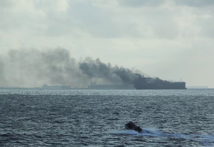 A handout image shows the RSS Supreme's rigid-hulled inflatable boat in the vicinity of the burning vessels following a fire on two oil tankers about 55 km (34 miles) northeast of the Singaporean island of Pedra Branca, July 19, 2024. (Reuters) A handout image shows the RSS Supreme's rigid-hulled inflatable boat in the vicinity of the burning vessels following a fire on two oil tankers about 55 km (34 miles) northeast of the Singaporean island of Pedra Branca, July 19, 2024. (Reuters)
