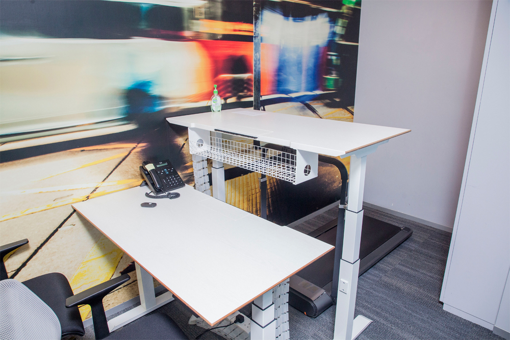 Standing desks and under-desk treadmills are available to encourage exercise and promote staff wellbeing.