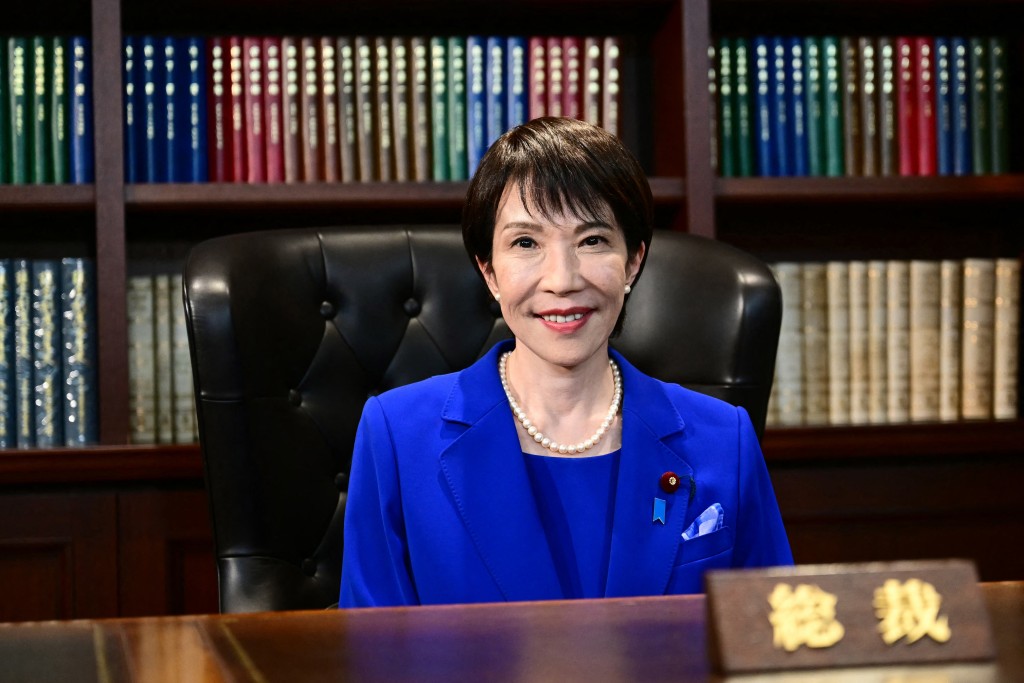 Sanae Takaichi, the newly elected leader of Japan's ruling party, the Liberal Democratic Party (LDP), poses in the party leader's office after the LDP leadership election in Tokyo on October 4, 2025. (AFP)