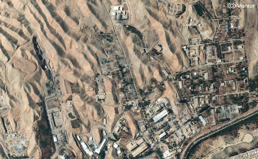 Photo by - / SATELLITE IMAGE ©2026 VANTOR / AFP  This handout satellite image courtesy of Vantor taken and released on March 6, 2026, shows the Parchin military complex in Iran following a military strike, on March 6, 2026.