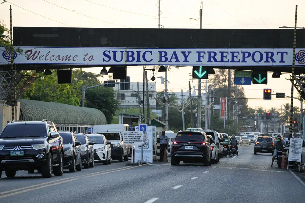 Vehicles pass by one of the gates in what used to be America's largest overseas naval base at the Subic Bay Freeport Zone, Zambales province, northwest of Manila, Philippines. (AP) Vehicles pass by one of the gates in what used to be America's largest overseas naval base at the Subic Bay Freeport Zone, Zambales province, northwest of Manila, Philippines. (AP)