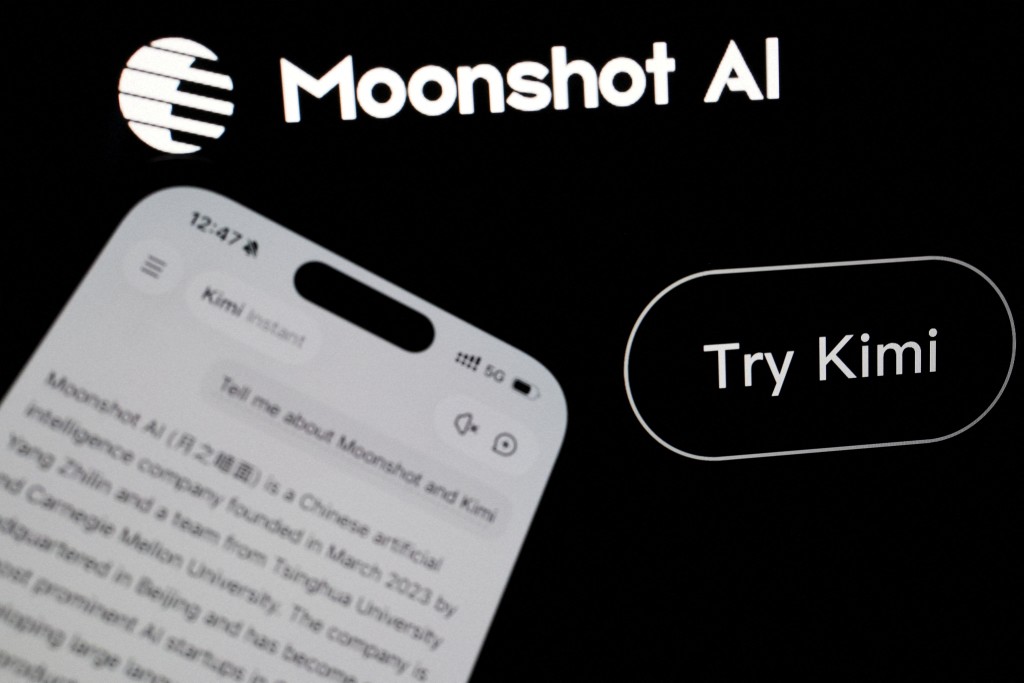 The logo of Chinese company Moonshot AI is displayed alongside its Kimi app on a mobile phone, in this illustration picture taken July 24, 2026. REUTERS/Florence Lo/Illustration