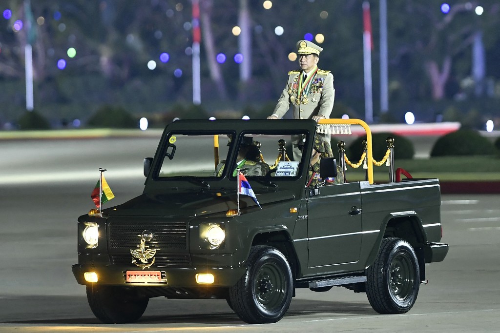 Myanmar's junta chief military Min Aung Hlaing arrives to deliver a speech during a ceremony to mark the country's Armed Forces Day in Naypyidaw on March 27, 2024. Myanmar's junta ended the country's state of emergency on July 31, 2025, ramping up preparations for a December election being boycotted by opposition groups and criticised by international monitors. (Photo by AFP)