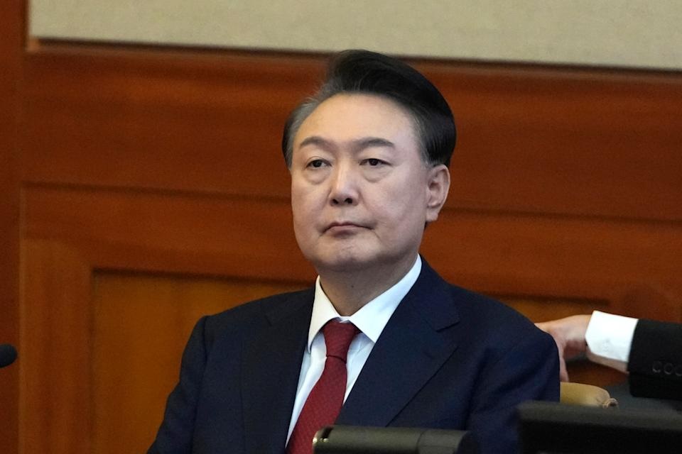 FILE - South Korea's impeached President Yoon Suk Yeol attends a hearing of his impeachment trial at the Constitutional Court in Seoul, South Korea, Tuesday, Feb. 11, 2025. (AP Photo/Lee Jin-man, Pool, File) FILE - South Korea's impeached President Yoon Suk Yeol attends a hearing of his impeachment trial at the Constitutional Court in Seoul, South Korea, Tuesday, Feb. 11, 2025. (AP Photo/Lee Jin-man, Pool, File)