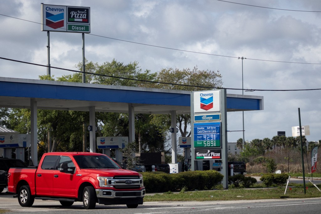 Gas prices are displayed at a gas station as the prices of oil and gas surge, amid the US-Israel conflict with Iran, in Titusville, Florida, US, March 31, 2026. REUTERS