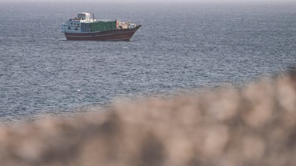 A vessel in the Strait of Hormuz, as seen from Musandam,Oman, July 16, 2026. REUTERS/Stringer