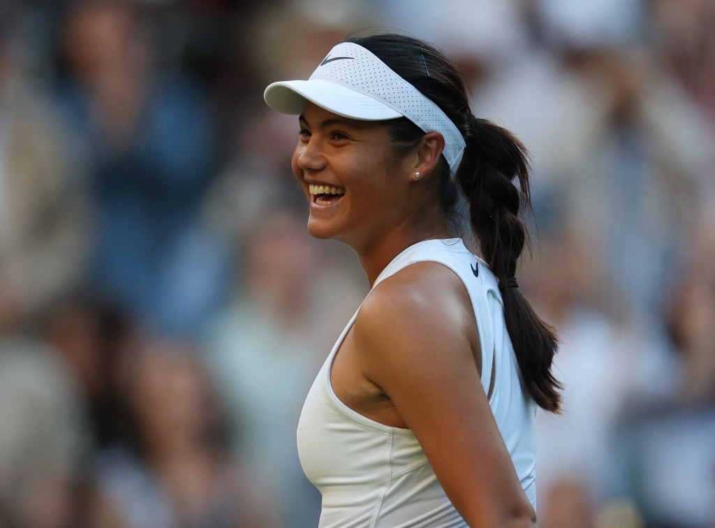 Britain's Emma Raducanu celebrates winning her second round match against Czech Republic's Marketa Vondrousova. (Reuters)