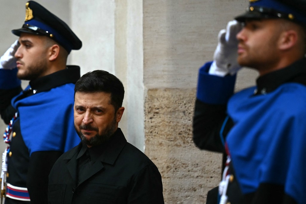 Ukraine's President Volodymyr Zelensky arrives at Palazzo Chigi prior a meeting with Italy's Prime Minister, Giorgia Meloni, in Rome on December 9, 2025. (Photo by Filippo MONTEFORTE / AFP)