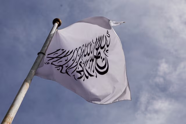 A flag of the Islamic Emirate of Afghanistan flutters at the Embassy of Afghanistan in Beijing, China October 19, 2023. (REUTERS/Tingshu Wang/File Photo)