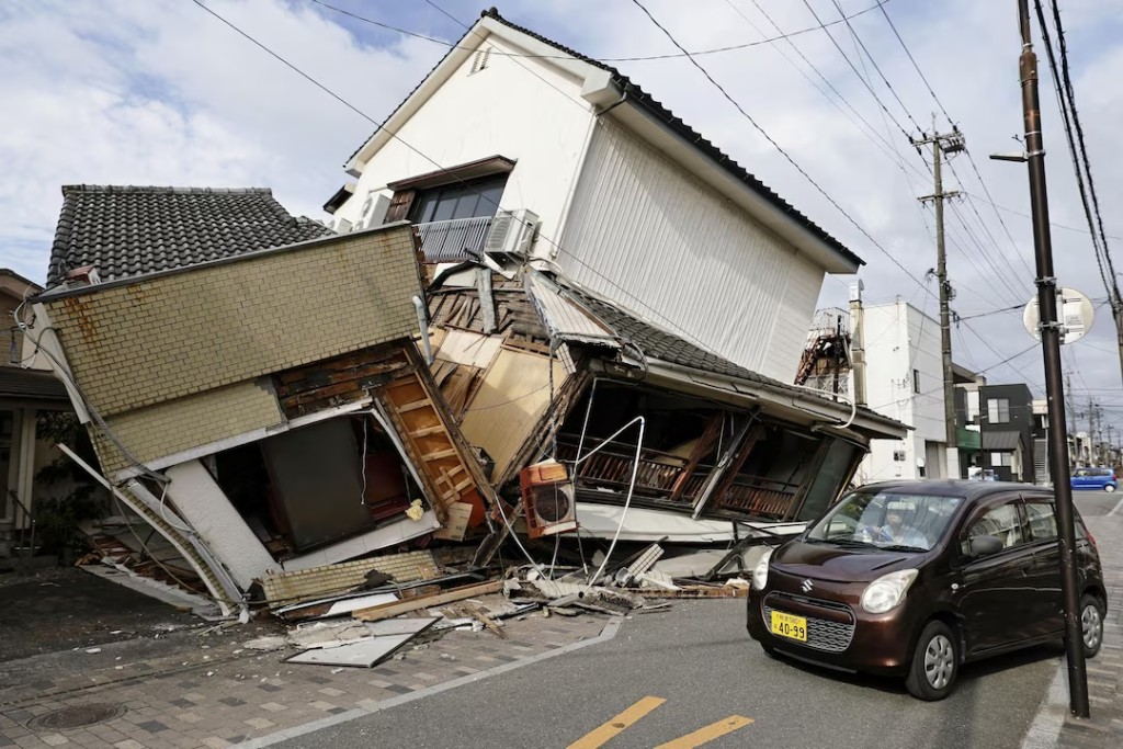 Buildings that collapsed after an earthquake with a magnitude of 7.1 struck Japan's southern Kumamoto prefecture, in Yatsushiro City, Japan, July 29, 2026. Kyodo/via REUTERS