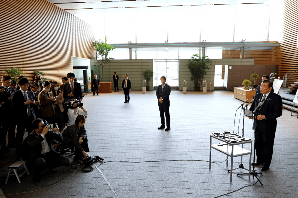 Japanese Prime Minister Shigeru Ishiba reacts as he speaks to reporters after a Japanese negotiator held ministerial talks at the White House regarding US tariffs, at the prime minister’s official residence in Tokyo, Japan, 17 April 2025. FRANCK ROBICHON/Pool via REUTERS
