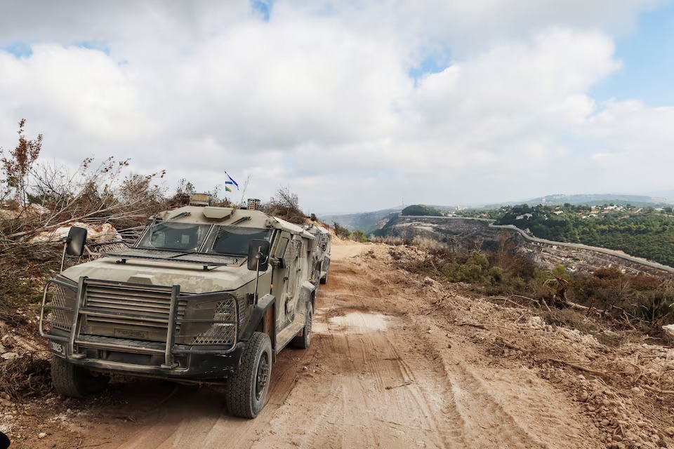 Israeli military vehicles in southern Lebanon, October 13, 2024. (Reuters) Israeli military vehicles in southern Lebanon, October 13, 2024. (Reuters)