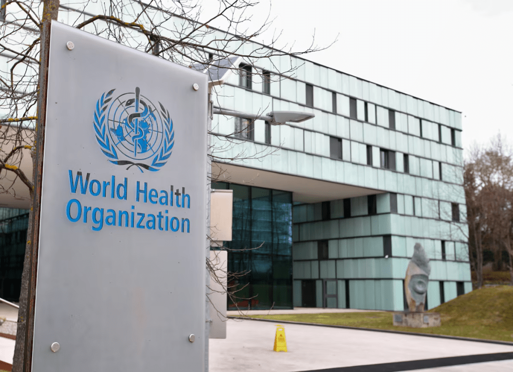 A logo is pictured outside a building of the World Health Organization (WHO) during an executive board meeting on update on the coronavirus outbreak, in Geneva, Switzerland, February 6, 2020. REUTERS/Denis Balibouse/File Photo 